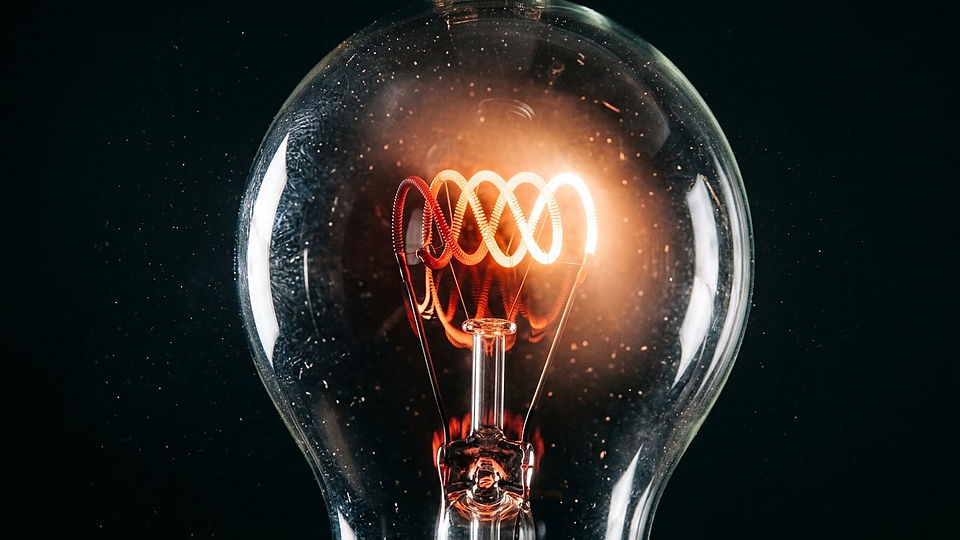 Illustration photoréaliste en lien avec la fiche « La constante de Wien relie la longueur d'onde d'émission maximale à la température. » : Filament de tungstène incandescent.